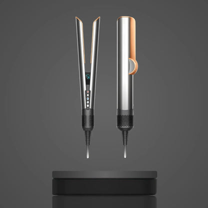 Modern sleek silver and rose gold hair straightener with digital display and control buttons on gray Air Straightener 2-in-1 airflow hair dryer and straightenerbackground